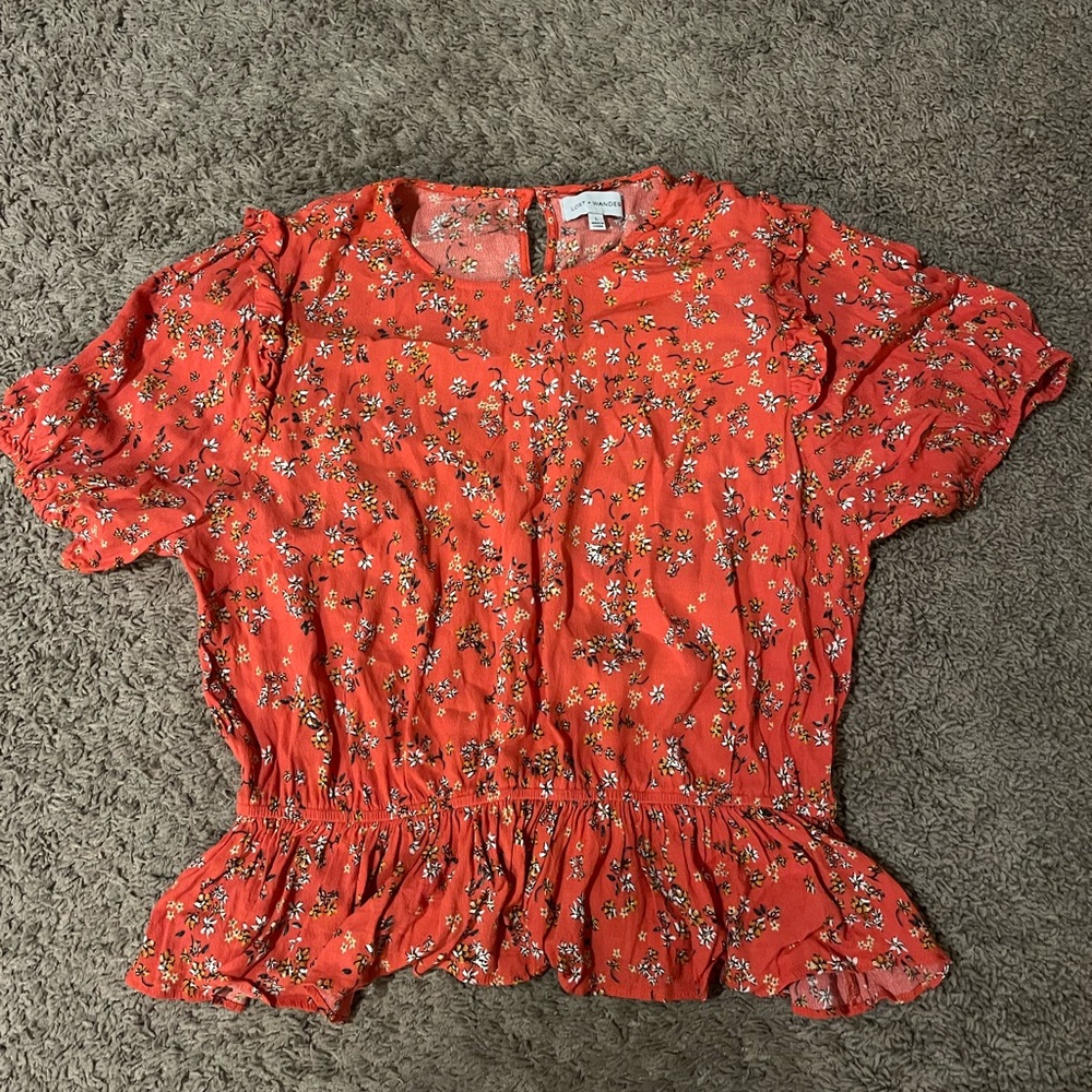 Red floral peplum top